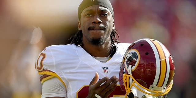 SANTA CLARA, CA - NOVEMBER 23: Robert Griffin III #10 of the Washington Redskins looks on during pre-game warm ups prior to playing the San Francisco 49ers at Levi's Stadium on November 23, 2014 in Santa Clara, California. (Photo by Thearon W. Henderson/Getty Images)