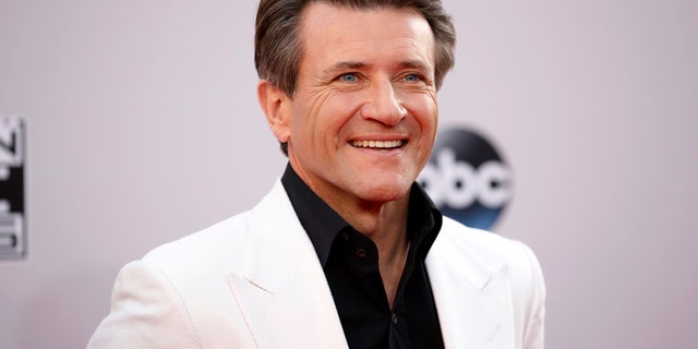 Robert Herjavec, from the reality show "Shark Tank," arrives at the 42nd American Music Awards in Los Angeles, California November 23, 2014.