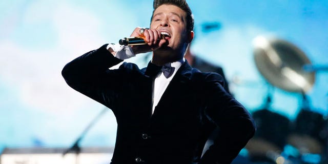 Jan. 26, 2014: Robin Thicke performs "Blurred Lines" with Chicago at the 56th annual Grammy Awards in Los Angeles, California.