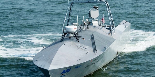 The Navy recently test-fired missiles from a robot boat. Here a common unmanned surface vehicle patrols for intruders during the Trident Warrior 2011 experiment.