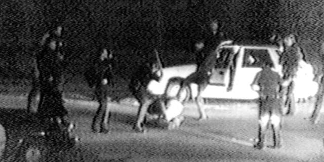 March 31, 1991: FILE - This image taken from video taken by George Holliday shows police officers beating a man, later identified as Rodney King.