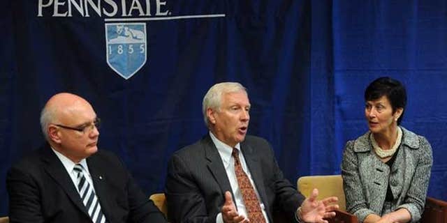 July 23, 2012: Penn State president Rodney Erickson, center, talks during an interview with the Centre Daily Times in State College, Pa.