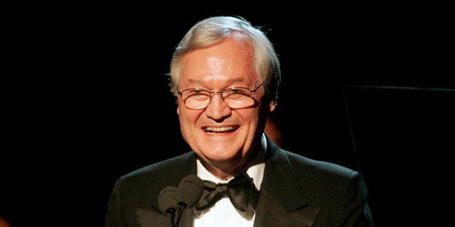 Producer and director Roger Corman gives his acceptance speech after receiving the David O. Selznick Achievement Award in Theatrical Motion Pictures at the 2006 Producers Guild Awards in Los Angeles, California January 22, 2006. Corman has produced and directed over 300 films in his career. REUTERS/Fred Prouser - RP3DSFDCPKAD
