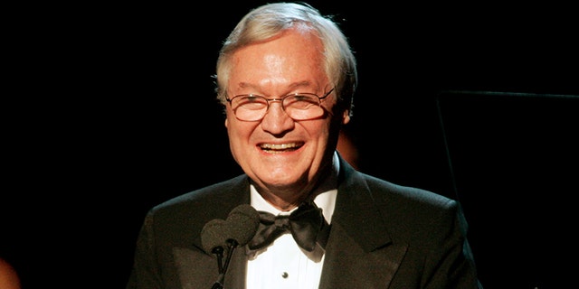 Producer and director Roger Corman gives his acceptance speech after receiving the David O. Selznick Achievement Award in Theatrical Motion Pictures at the 2006 Producers Guild Awards in Los Angeles, California January 22, 2006. Corman has produced and directed over 300 films in his career. REUTERS/Fred Prouser - RP3DSFDCPKAD