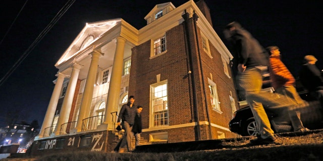 Jan. 15, 2015: Students participating in rush pass by the Phi Kappa Psi house at the University of Virginia in Charlottesville, Va.