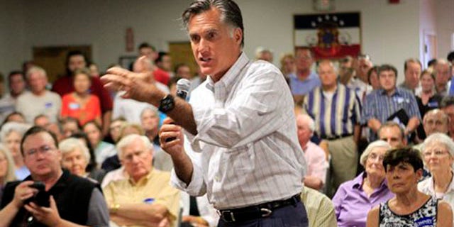 Former Massachusetts Gov. Mitt Romney speaks to a packed crowd during a Town Hall meeting Aug. 8 in Nashua, N.H.