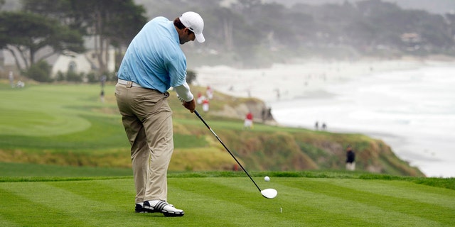 Former Dallas Cowboys quarterback Tony Romo tees off during a practice round ahead of this week's AT&amp;T Pebble Beach National Pro-Am