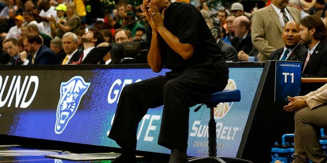 JACKSONVILLE, FL - MARCH 19: Head coach Ron Hunter of the Georgia State Panthers coaches from a chair during the second round of the 2015 NCAA Men's Basketball Tournament at Jacksonville Veterans Memorial Arena on March 19, 2015 in Jacksonville, Florida. Hunter injured his Achilles last week during the Sun Belt Conference tournament championship game. (Photo by Kevin C. Cox/Getty Images)