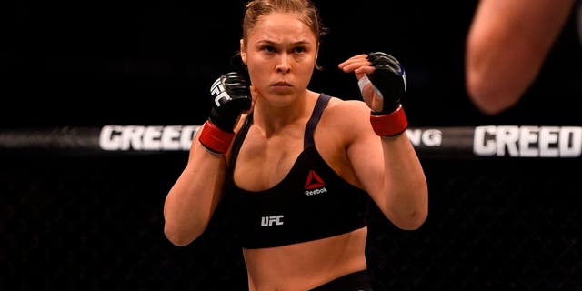 MELBOURNE, AUSTRALIA - NOVEMBER 15: Ronda Rousey faces facing Holly Holm in their women's bantamweight championship bout during the UFC 193 event at Etihad Stadium on November 15, 2015 in Melbourne, Australia. (Photo by Jeff Bottari/Zuffa LLC/Zuffa LLC via Getty Images)