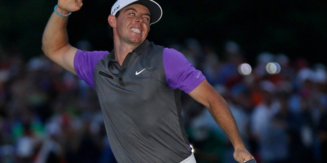 Aug. 10, 2014: Rory McIlroy, of Northern Ireland, celebrates after winning the PGA Championship golf tournament at Valhalla Golf Club in Louisville, Kentucky.