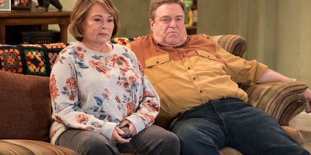 Roseanne Barr, left, and John Goodman appear on ABC's "Roseanne" reboot.
