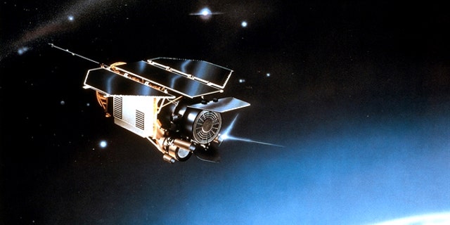 An artist's impression of the German ROSAT satellite orbiting in space.