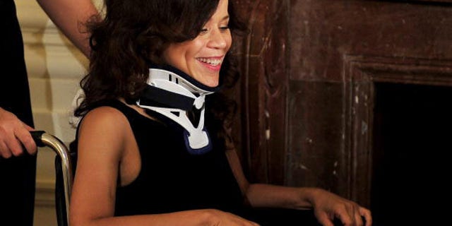 WASHINGTON - JULY 13: (AFP OUT) Actress Rosie Perez awaits the arrival of U.S. President Barack Obama to speak about the new National HIV/AIDS Strategy (NHAS) in the East Room of the White House July 13, 2010 in Washington, DC. The strategy, unveiled today by the White House, aims to use federal inter-agency and inter-department resources to reduce the number of people who become infected with HIV, increase access to care and optimizing health outcomes for people living with HIV and reduce HIV-related health disparities. (Photo by Ron Sachs-Pool/Getty Images)