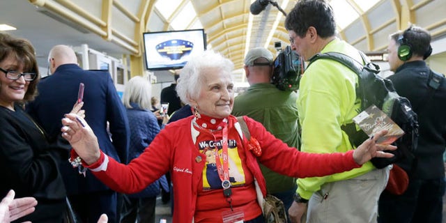 March 22, 2016: Former Rosie, Sylvia Tanis is greeted at the Ronald Reagan Washington National Airport.