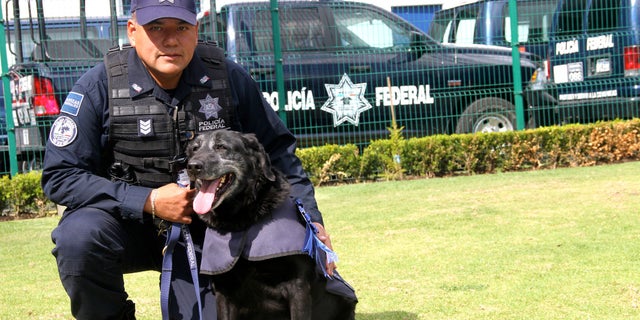 Deputy Officer Jorge Luis López and Rosty.