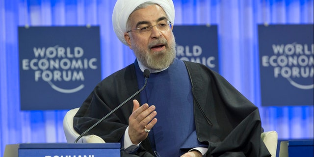 Jan. 23, 2014: Iranian President Hassan Rouhani gestures as speaks during a session of the World Economic Forum in Davos, Switzerland.