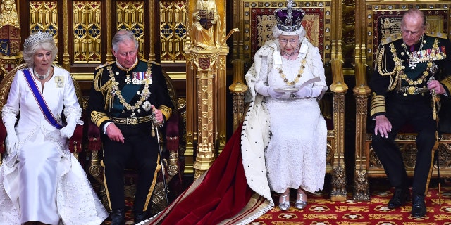 Camilla Bowles and Prince Charles sit beside the Queen during a 2015 event.