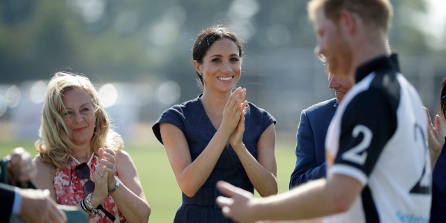 Meghan cheered on her husband from the sidelines during his annual polo match.