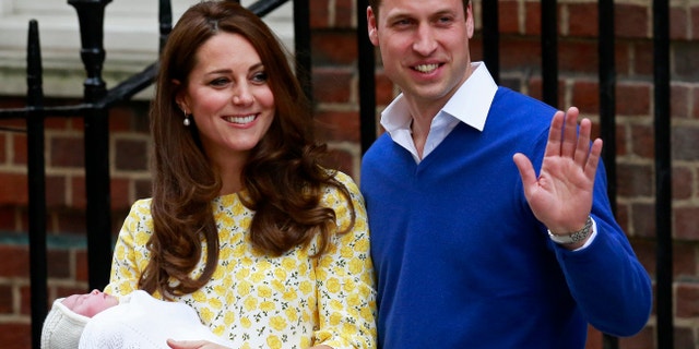 Britain's Prince William and his wife Catherine, Duchess of Cambridge appear with their baby daughter, Charlotte.