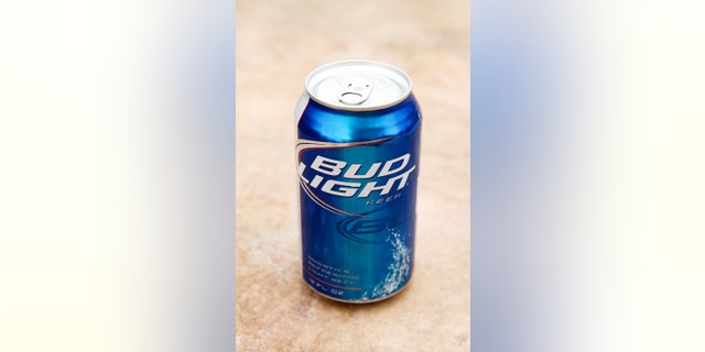 Indio, USA - June 1, 2011: A product shot of a can of Bud Light beer on a stone background. Bud Light is manufactured by Anheuser Busch,
