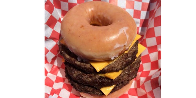 Introducing a triple-decker Krispy Kreme cheeseburger.