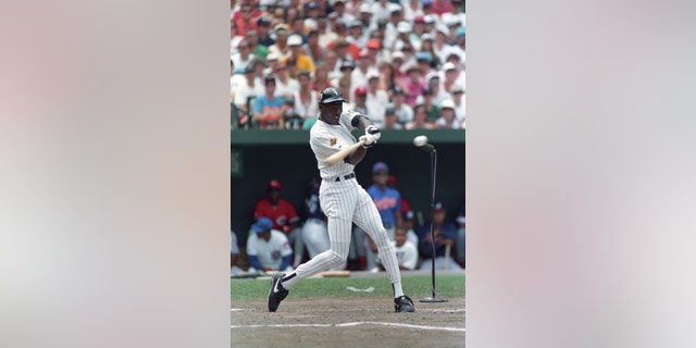 Chicago Bulls basketball player Michael Jordan hits the ball during a celebrity home run hitting contest as part of the Baseball All Star game festivities in Baltimore, Maryland July 12, 1993. REUTERS/Joe Giza (UNITED STATES SPORT BASEBALL) BEST QUALITY AVAILABLE - RTR26HFL