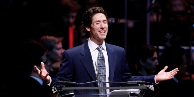 Joel Osteen preaches during a church service. "The battle to overcome a setback is so often in our mindset," he told Fox News Digital. 