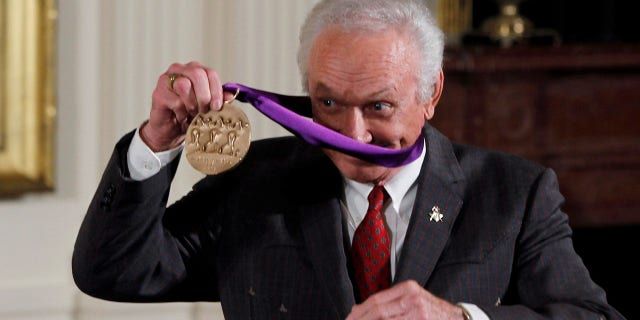 Mel Tillis is pictured with his National Medal of Arts after being presented with the award by U.S. President Barack Obama during a ceremony in the East Room of the White House in Washington.
