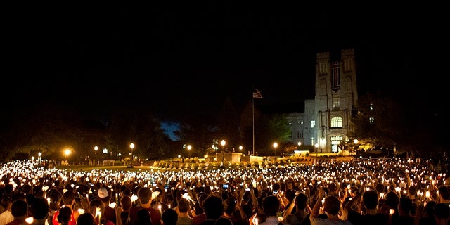 Members of the Blacksburg, Va., community hold a candlelight vigil five years after a mentally ill student went on a killing rampage around Virginia Tech's campus in 2007.