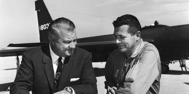Pilot Francis Gary Powers (R) speaks with U-2 designer Kelly Johnson in this 1966 U.S. Air Force handout photo.