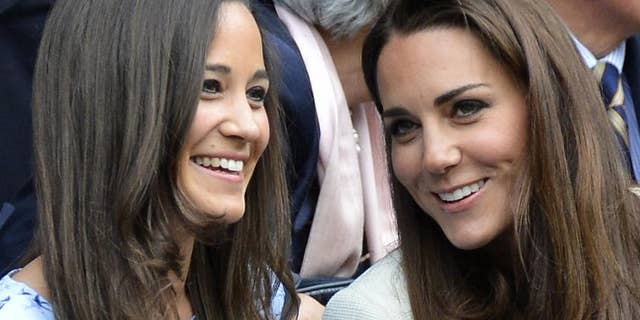 Pippa (L) with her older sister Catherine Middleton (R).
