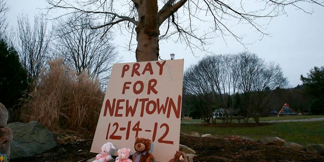 A makeshift memorial in Newtown, Conn., stands in honor of the 20 children and six adults Adam Lanza killed at Sandy Hook Elementary School in 2012.