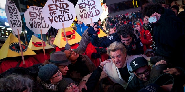Reverend Billy, a singer, performs during an "End of the World" celebration in New York on December 21, 2012.