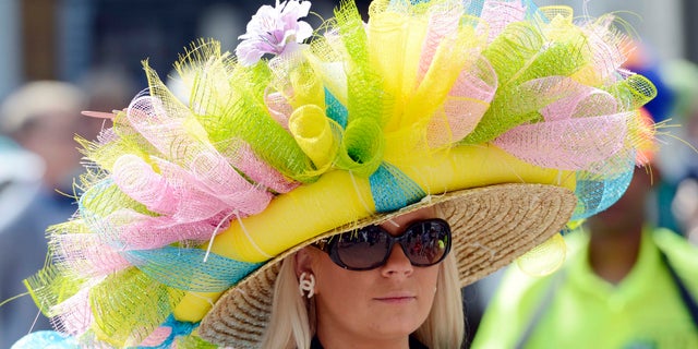 Ashley Cebak wears a derby hat before the 2014 Kentucky Derby at Churchill Downs.