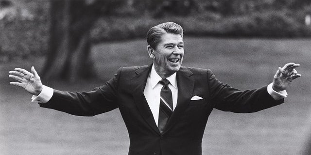 FILE -- Reagan is pictured waving to well-wishers on the south lawn of the White House on April 25, 1986.
