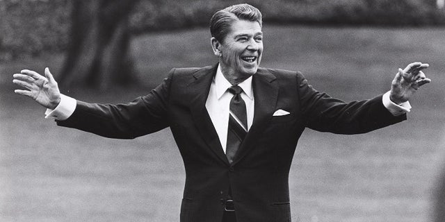 FILE -- Reagan is pictured waving to well-wishers on the south lawn of the White House on April 25, 1986.
