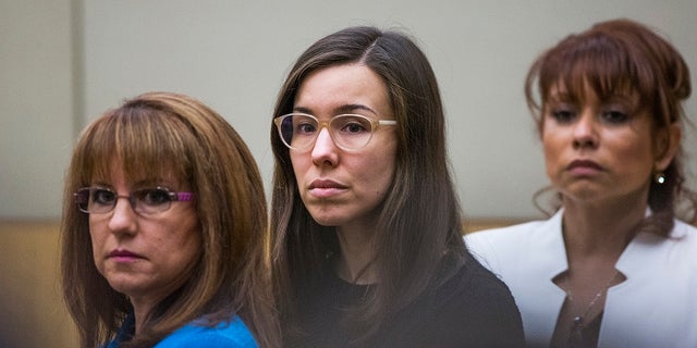Jodi Arias, center, watches the jury enter the courtroom for her sentencing phase retrial in Phoenix, March 5, 2015.