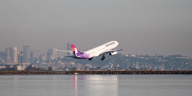 A file photo of a Hawaiian Airlines flight departing. The airline managed to take passengers "back in time" after a flight leaving New Zealand on Monday arrived in Hawaii on Sunday due to the time difference.