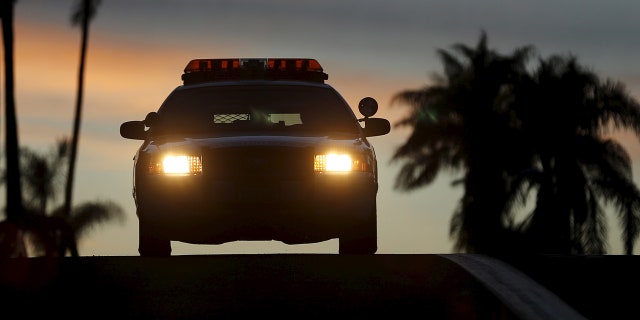 San Diego police said a man with a shotgun held up a 7-Eleven before having to break into his getaway car after locking the keys inside.