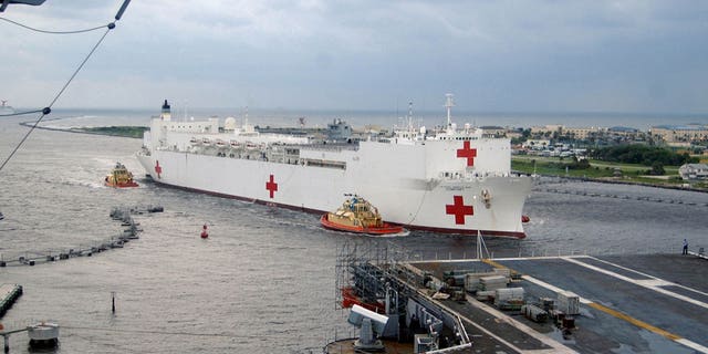 The Military Sealift Command (MSC) hospital ship USNS Comfort (T-AH 20) pulls into Naval Station Mayport, Florida, September 5, 2005, to take on supplies on their way to aid victims of Hurricane Katrina. The Navy's involvement in the Hurricane Katrina humanitarian assistance operations is led by the Federal Emergency Management Agency in conjunction with the Department of Defense.