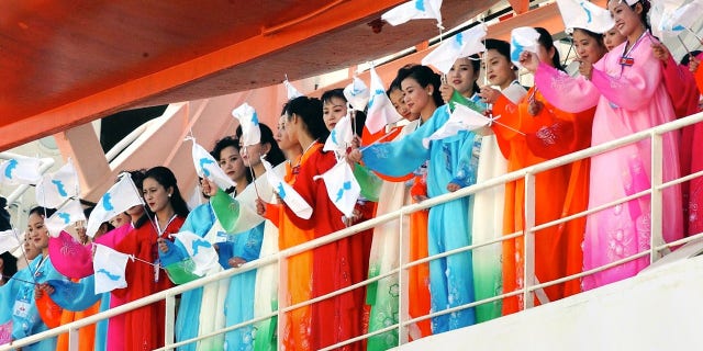 The North Korean cheer squad made its first appearance in the 2002 Asian Games in Busan.