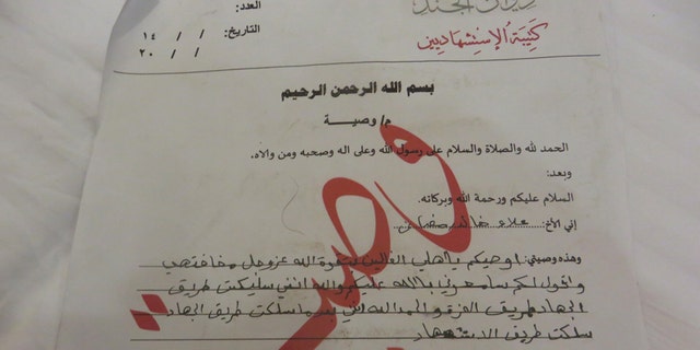 Teenage militant Alaa abd al-Akeedi's final letter to his family appears on official Islamic State stationery in Mosul in Erbil, Iraq, February 26, 2017. Picture taken February 26, 2017. REUTERS/Alaa Al-Marjani - RTS10LGS