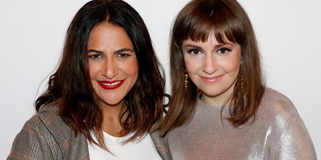 Lena Dunham apologized after comparing producer Judd Apatow's "obsession" with the rape accusations against Bill Cosby to an obsession with the Holocaust. Her comments were made during an interview with Jenni Konner (left) who was also the "Girls" showrunner.