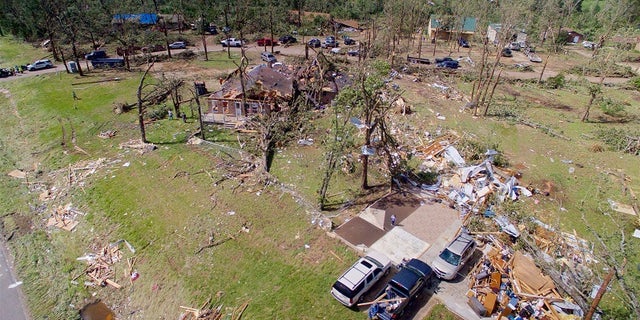 Homes are severely damaged after a tornado hit the town of Emory, Texas, on April 30, 2017.