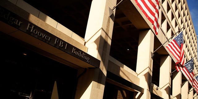 FBI agent David Raynor killed his estranged wife and then himself, officials said.