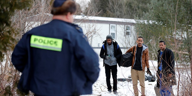 Three men who claimed to be from Sudan are confronted by Royal Canadian Mounted Police.