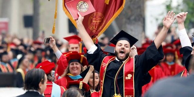Graduates to be celebrate before the commencement ceremony at the University of Southern California (USC) in Los Angeles, California, U.S., May 12, 2017. REUTERS/Patrick T. Fallon - RTS16FCR