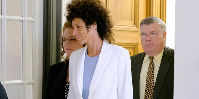 Bill Cosby accuser Andrea Constand leaves after the judge declared a mistrial in Cosby's sexual assault trial at the Montgomery County Courthouse in Norristown, Pennsylvania, U.S. June 17, 2017. REUTERS/Ed Hille/Pool - RTS17HDL