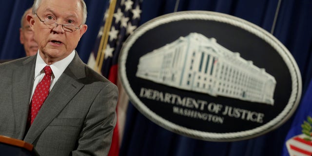 FILE -- Attorney General Jeff Sessions speaks at a briefing on leaks of classified material threatening national security at the Justice Department in Washington, U.S., August 4, 2017.
