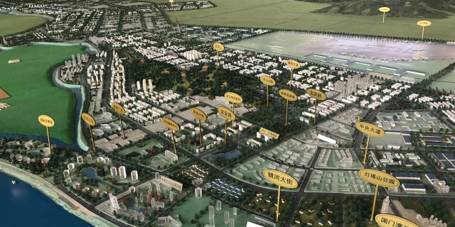 A city plan for the Dandong New Zone, around 9 miles from the city centre, is displayed in a sales center, in Dandong, Liaoning province, China, September 28, 2017.